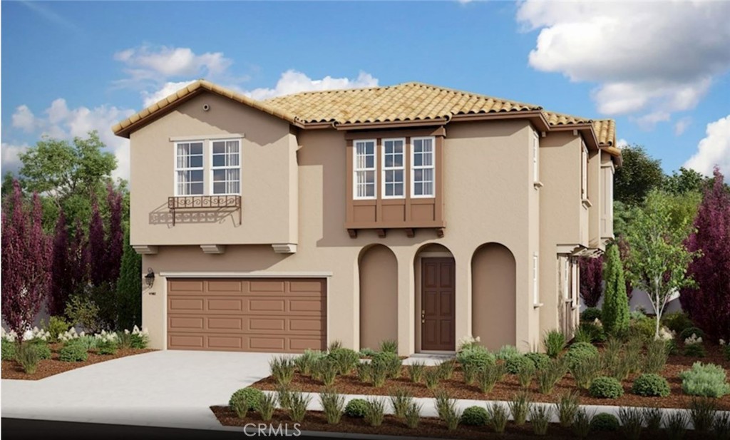 7179 Rindle Lane Riverside, CA 92503 - Photo 6 of 21 a front view of a house with a garden