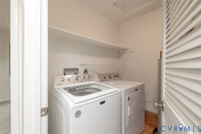 a view of a hallway with stairs