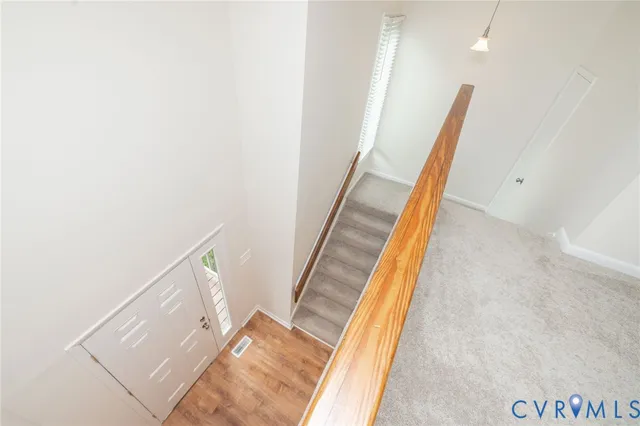 a room with a bed and a window