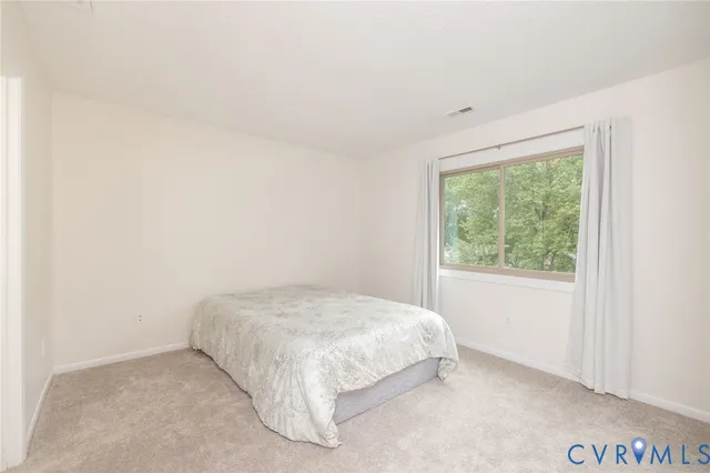 a large bed sitting in a room