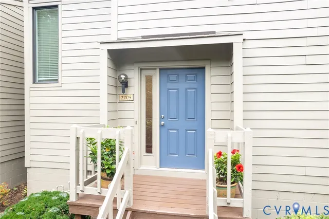 a front view of a house with a porch