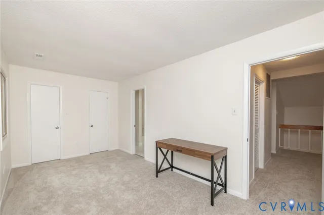 an outdoor space with furniture