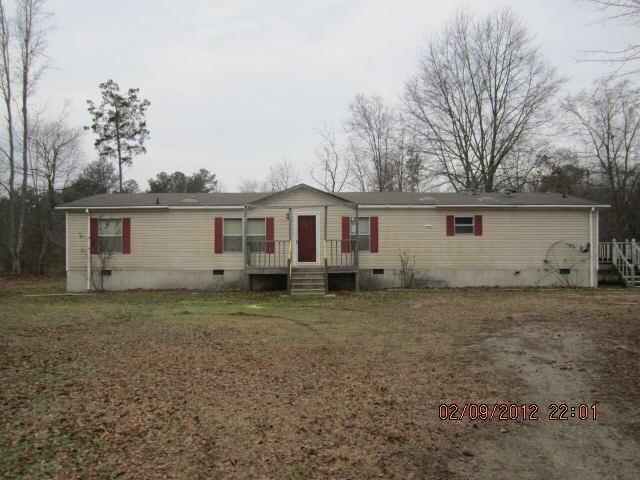 166 Deerfield Road Jackson, GA 30233 - Photo 1 of 1 a view of a house with a backyard