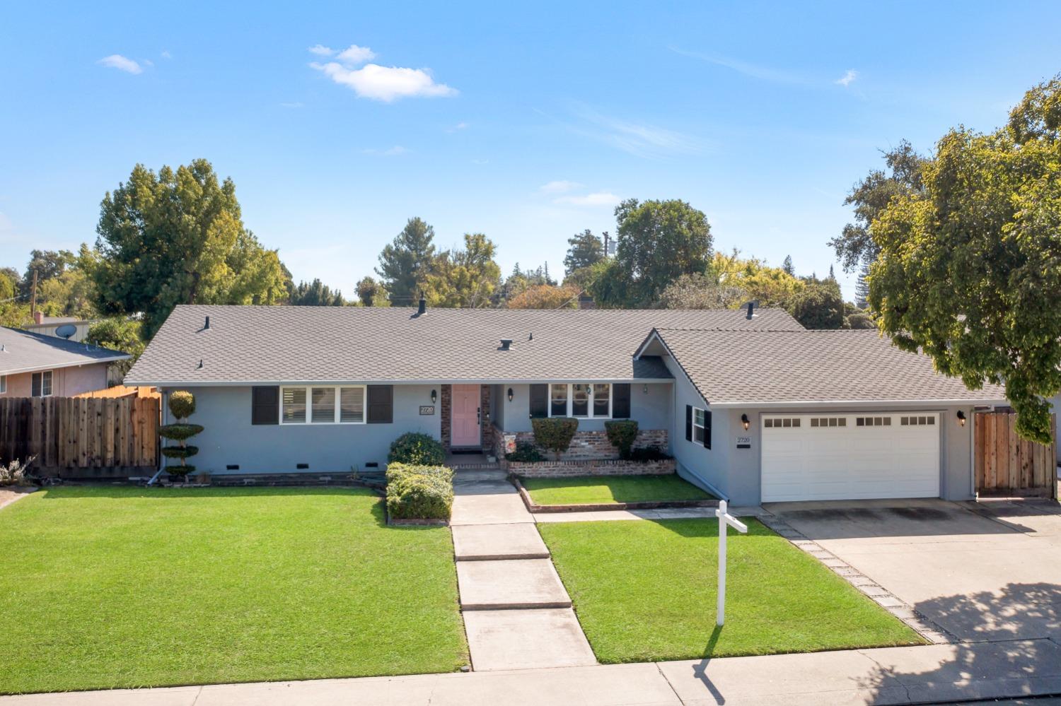 2720 Douglas Road Stockton, CA 95207 - Photo 1 of 1 a aerial view of a house with table and chairs