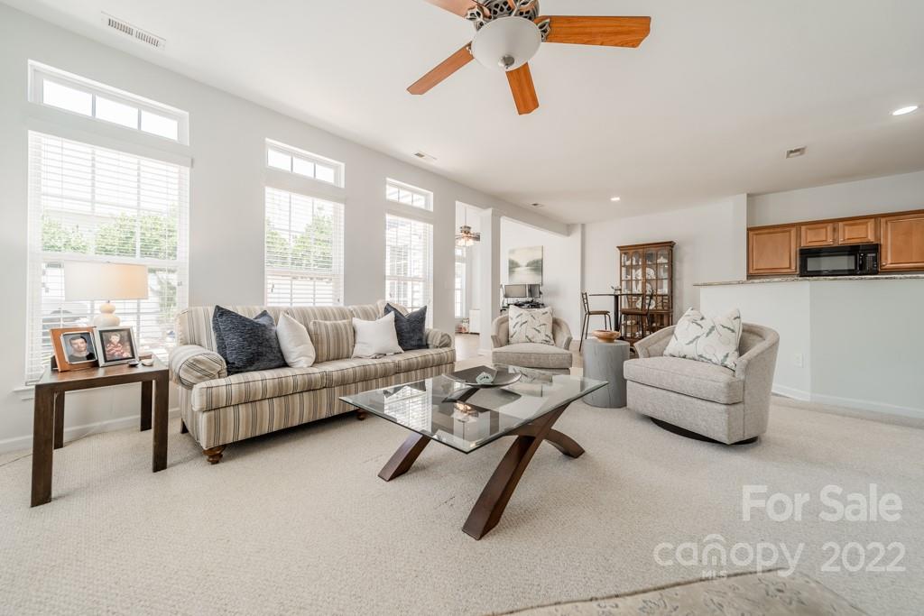 194 Snead Road Fort Mill, SC 29715 - Photo 9 of 43 a living room with furniture and a large window