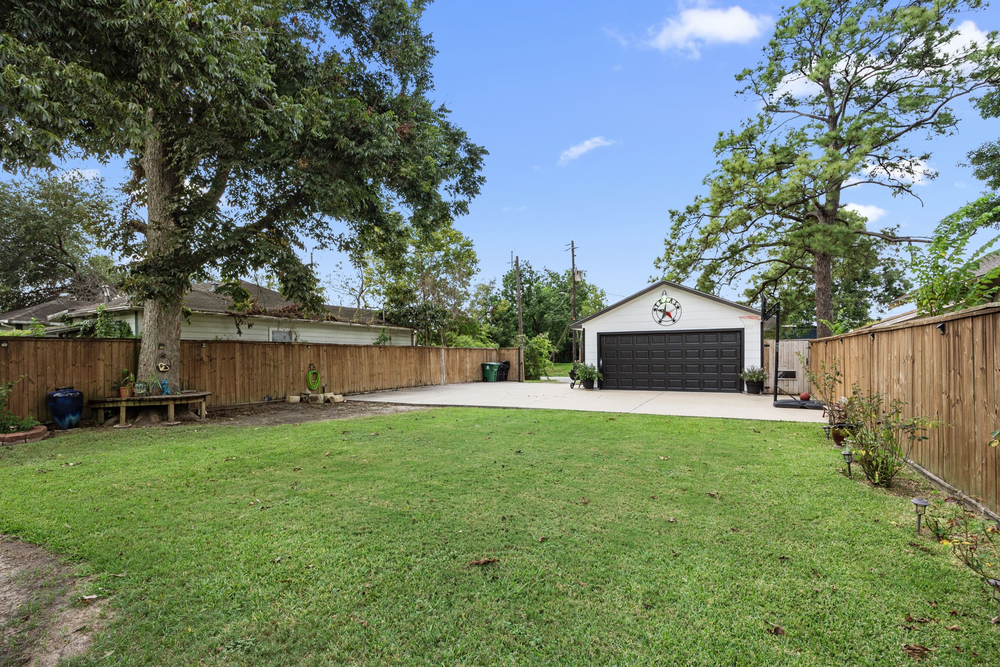 5221 McCormick Street Houston, TX 77023 - Photo 7 of 13 a front view of house with yard and trees