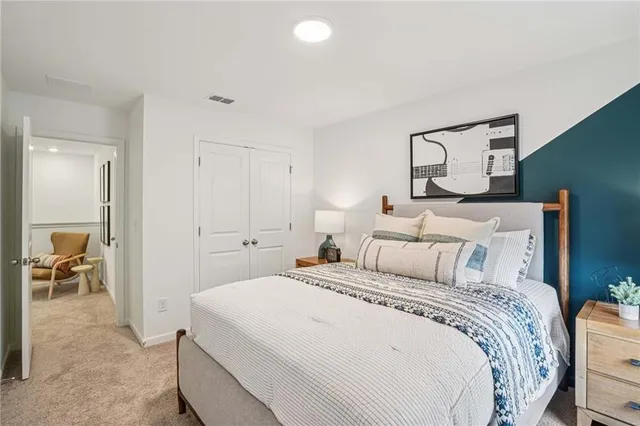 a view of a dining room with furniture and window