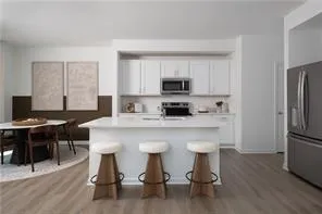 a kitchen with a sink cabinets and counter space