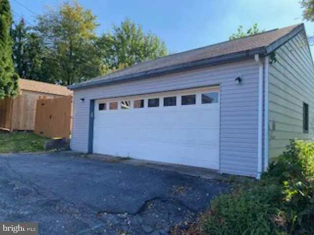 a house view with a backyard space