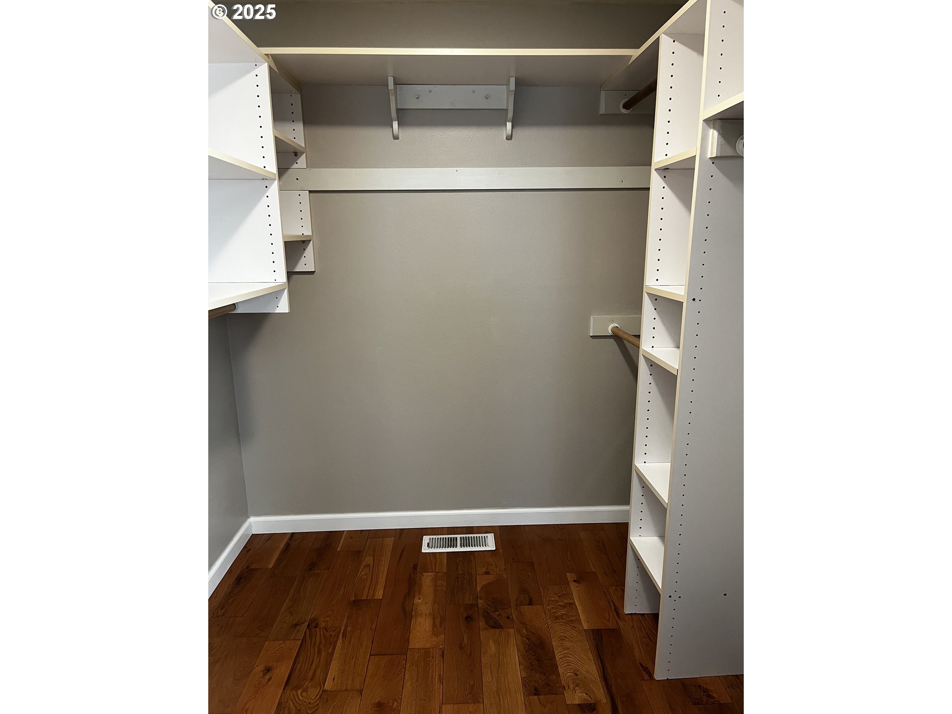7473 B Street Springfield, OR 97478 - Photo 11 of 28 a walk in closet with wooden floor