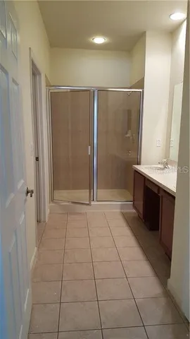 an empty room with a bathroom