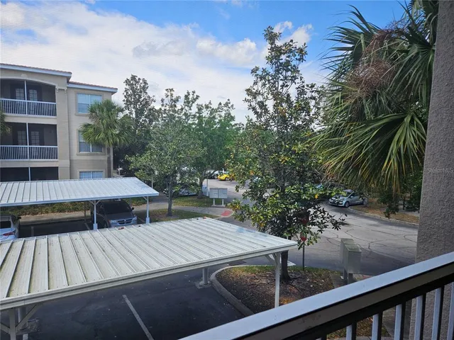 a bedroom with a bed and a mirror