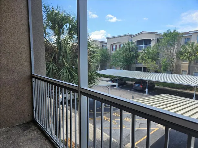 a bedroom with double bed and a window