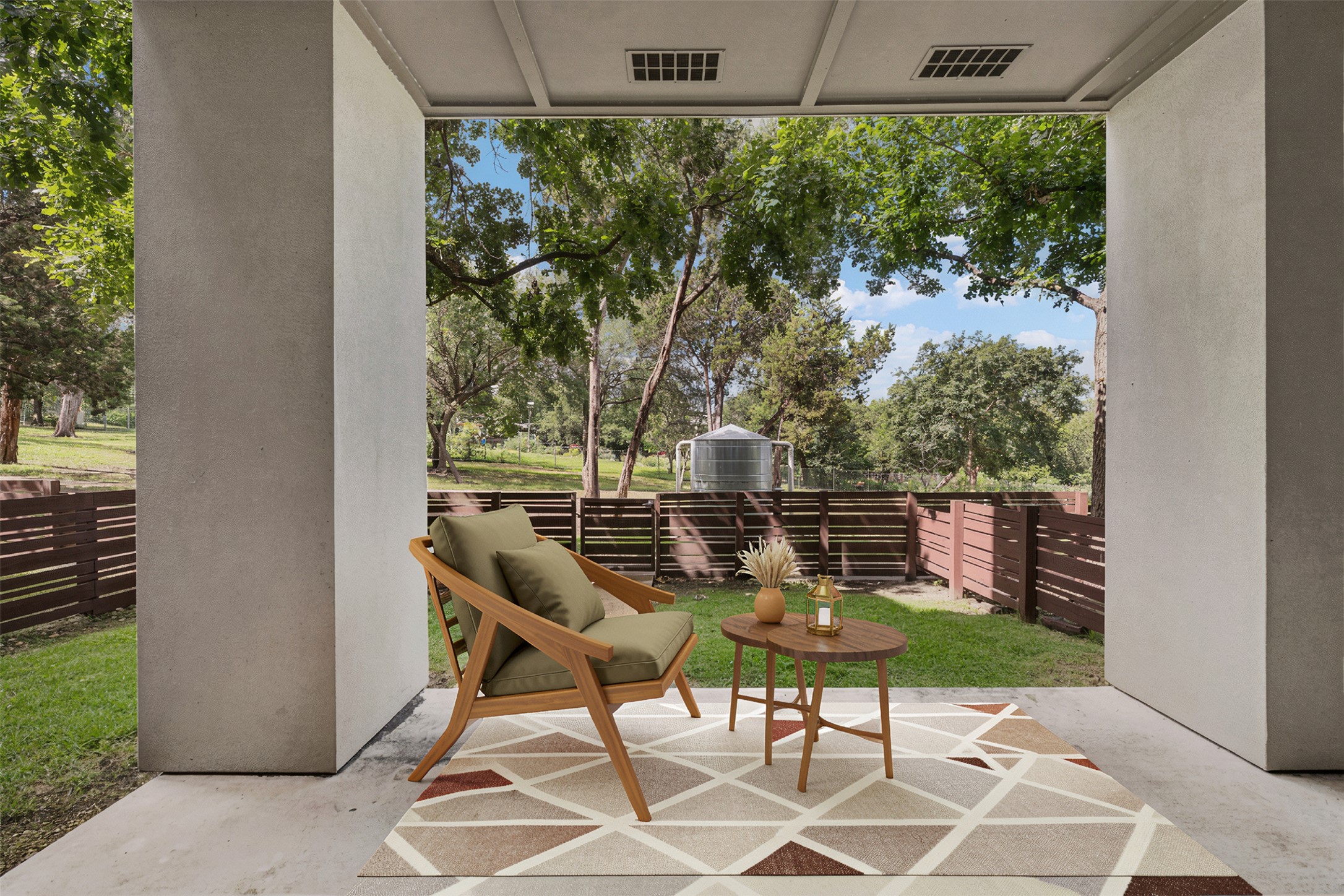 2804 Treble Lane, Unit 902 Austin, TX 78704 - Photo 24 of 31 a table and chairs in a patio