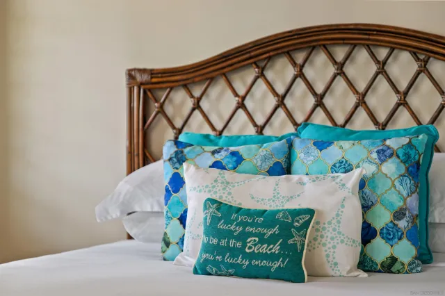 a black and white vase with flowers