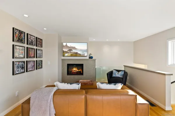 a room with a bed and a fireplace