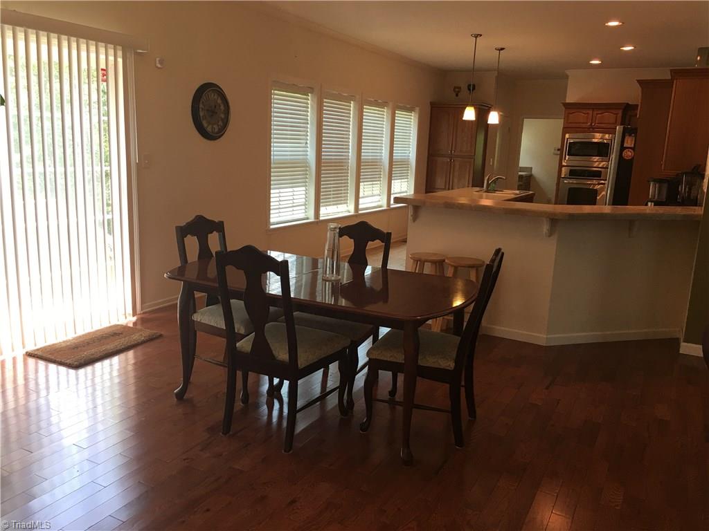 2089 Griffin Road Rural Hall, NC 27045 - Photo 6 of 30 Dining Room and Kitchen. Dining Room has new hardwood flooring.