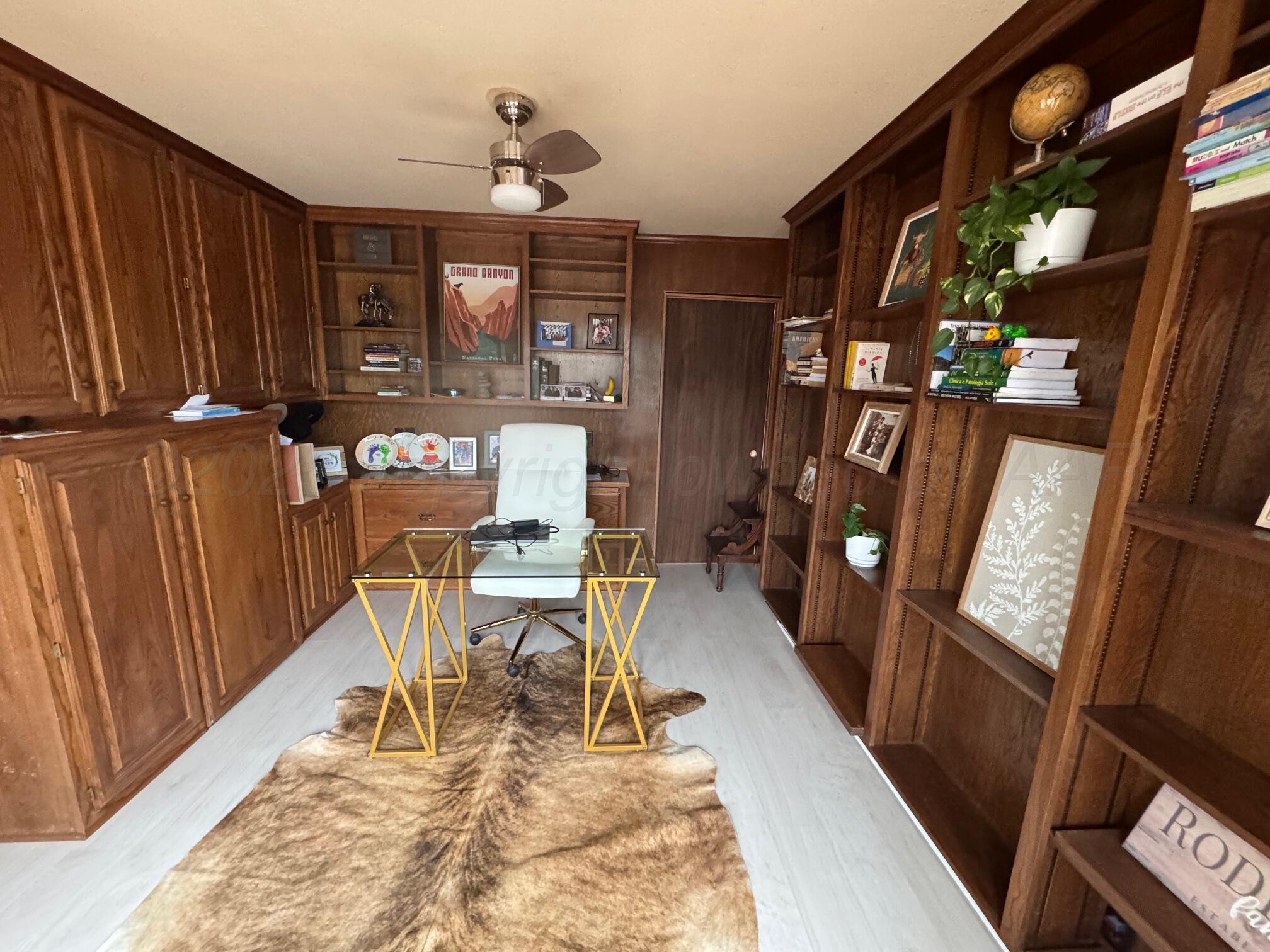 513 South Eton Street Perryton, TX 79070 - Photo 15 of 72 a view of a dining room with furniture and a rug