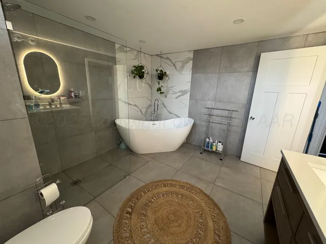 a bathroom with a sink and toilet