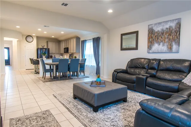 a view of a dining room with furniture