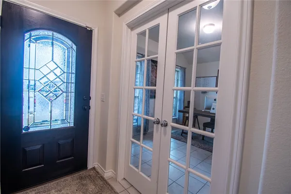 a view of livingroom with furniture and windows