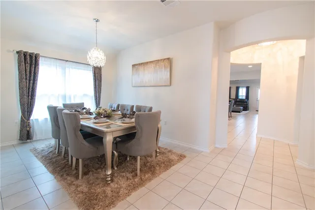 a view of a dining room with furniture