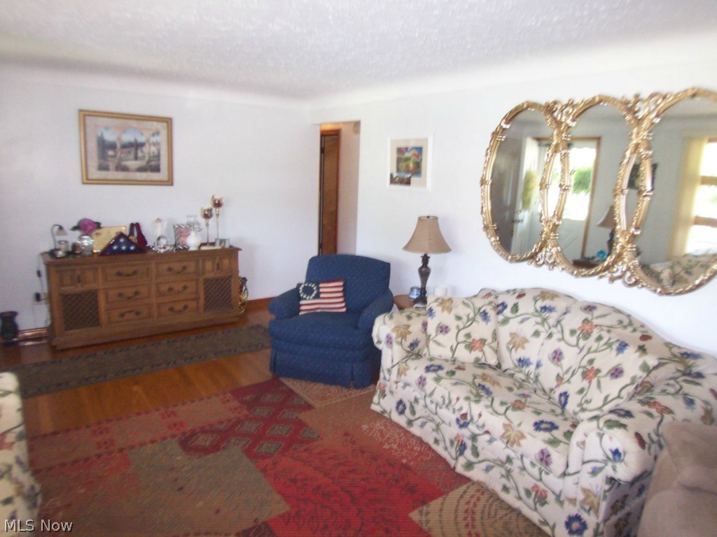 1608 Meister Road Lorain, OH 44053 - Photo 7 of 25 Another view of the living room. Again note the hardwood floors! What a bright, happy setting!