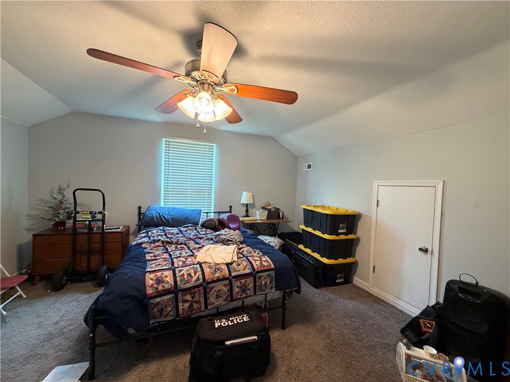 1124 Myrtle Street Suffolk, VA 23434 - Photo 15 of 15 Vaulted ceiling room featuring a ceiling fan with