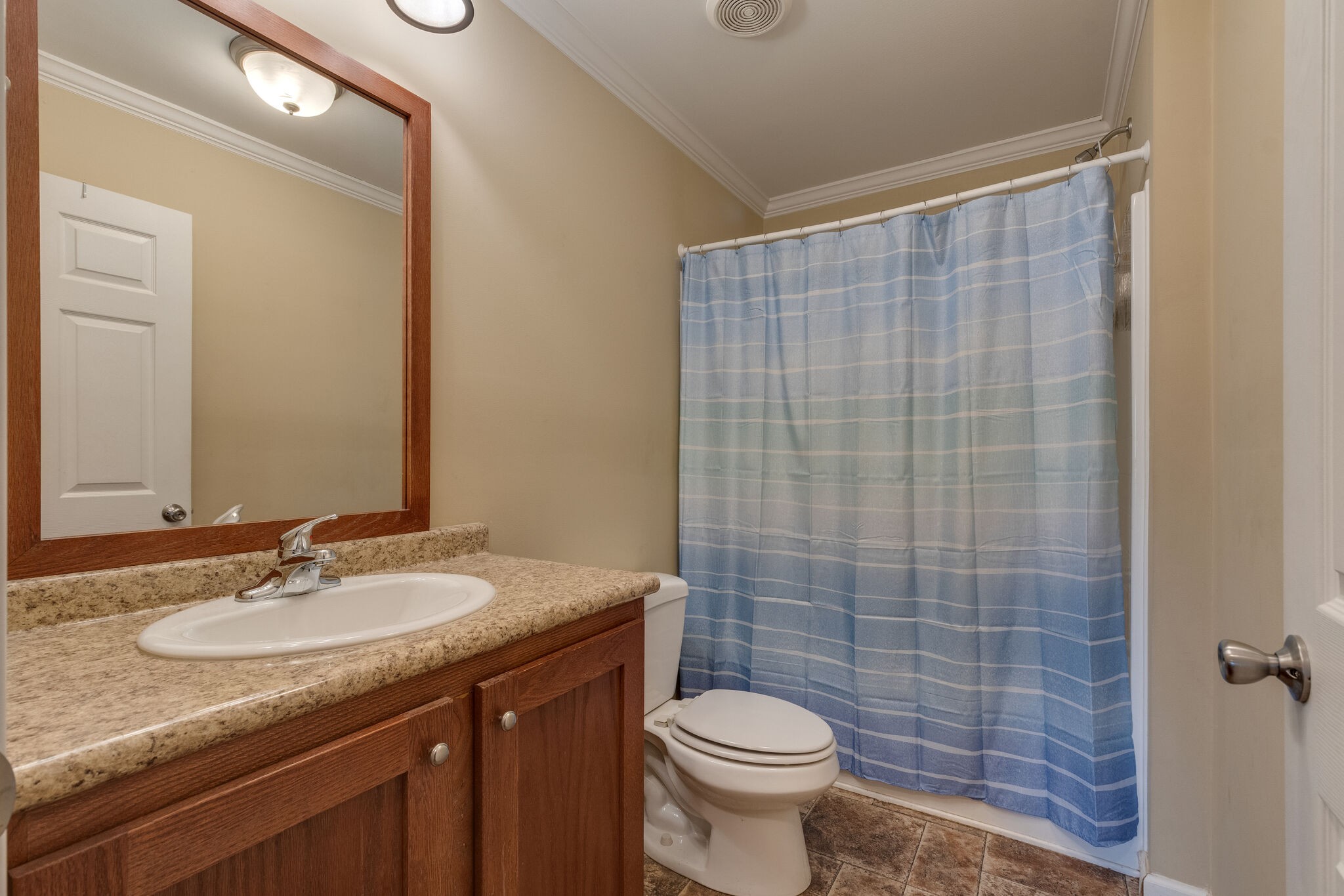 1149 Wrights Mill Road Spring Hill, TN 37174 - Photo 18 of 21 a bathroom with a granite countertop sink toilet and shower
