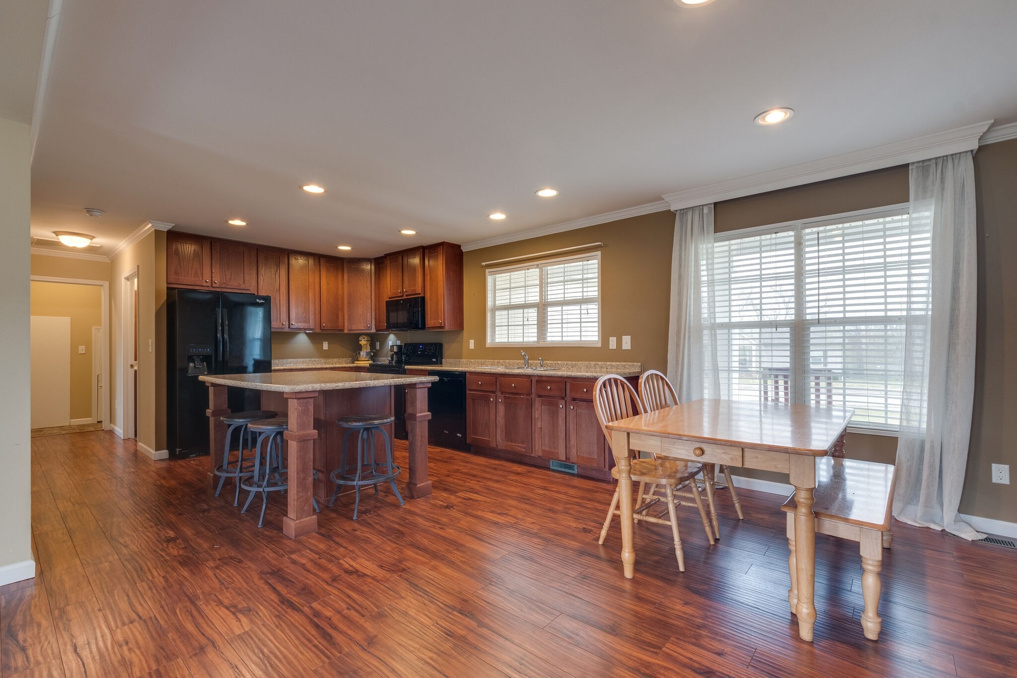1149 Wrights Mill Road Spring Hill, TN 37174 - Photo 8 of 21 a view of a dining room with furniture windows and wooden floor
