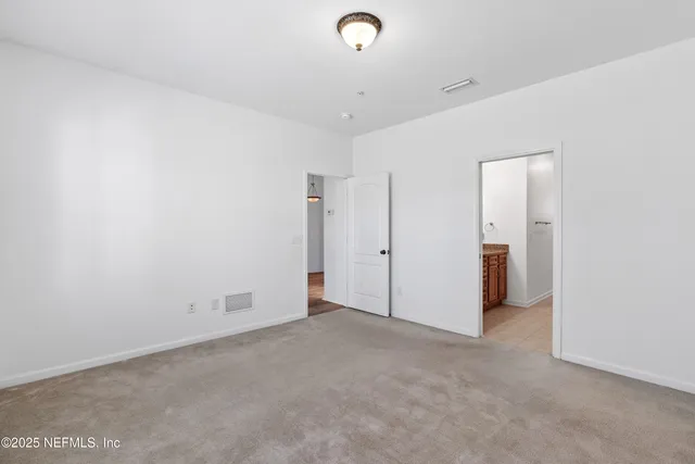 a front view of a house with swimming pool having outdoor seating