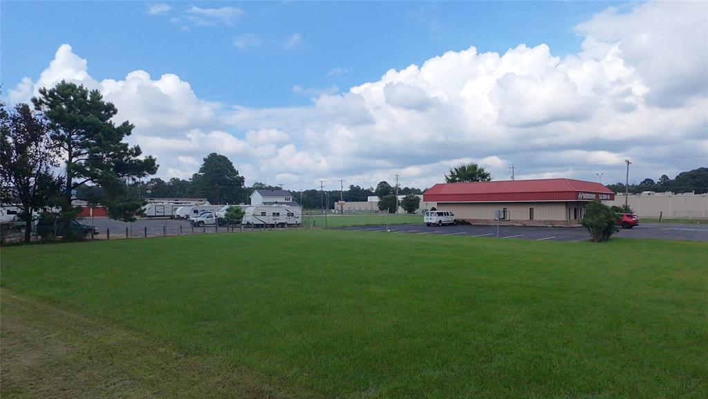 0 Industrial Road Shreveport, LA 71129 - Photo 3 of 7 a view of a fountain in front of a house