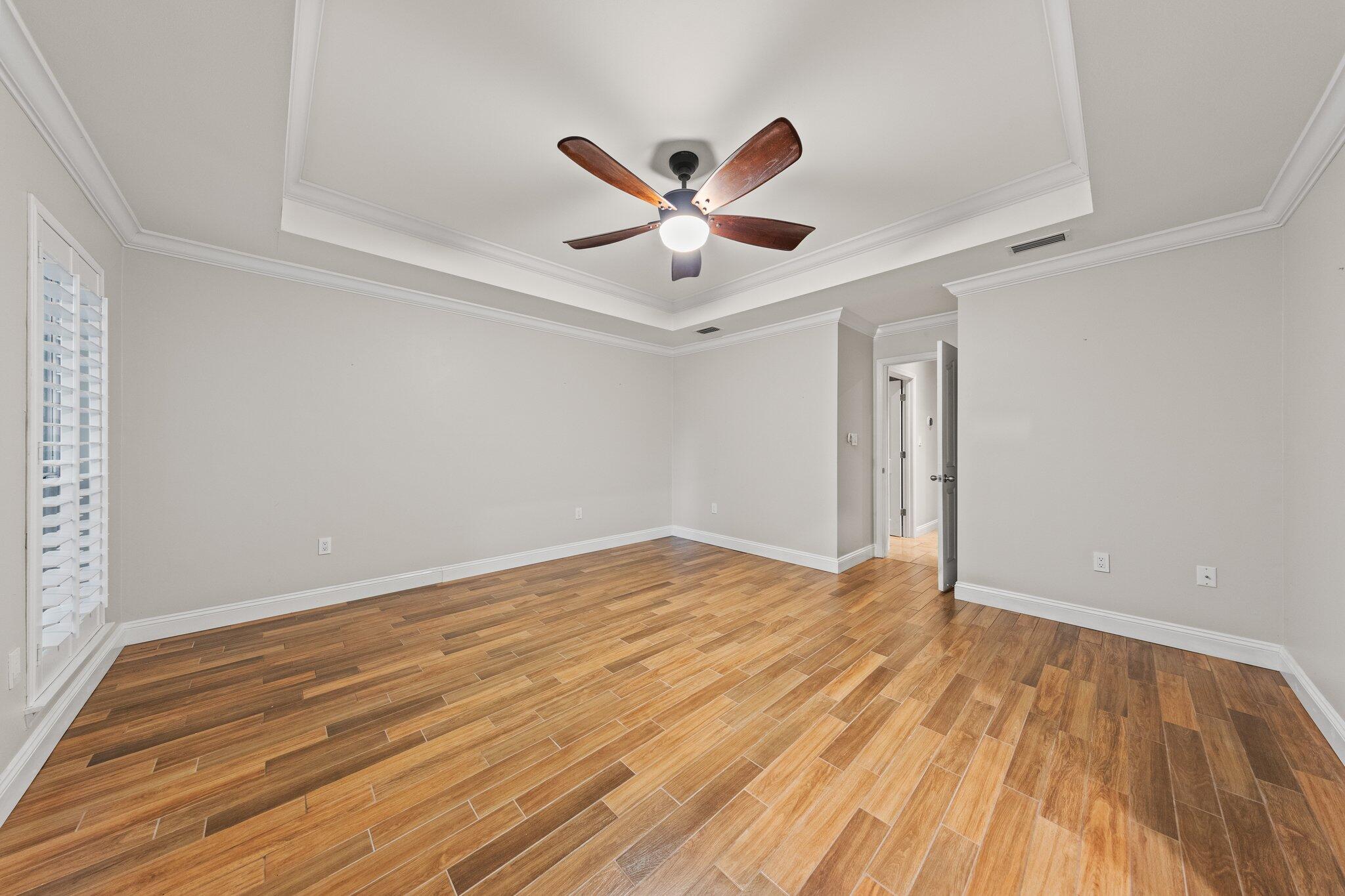 1825 Huntington Road Niceville, FL 32578 - Photo 32 of 68 a view of an empty room and wooden floor