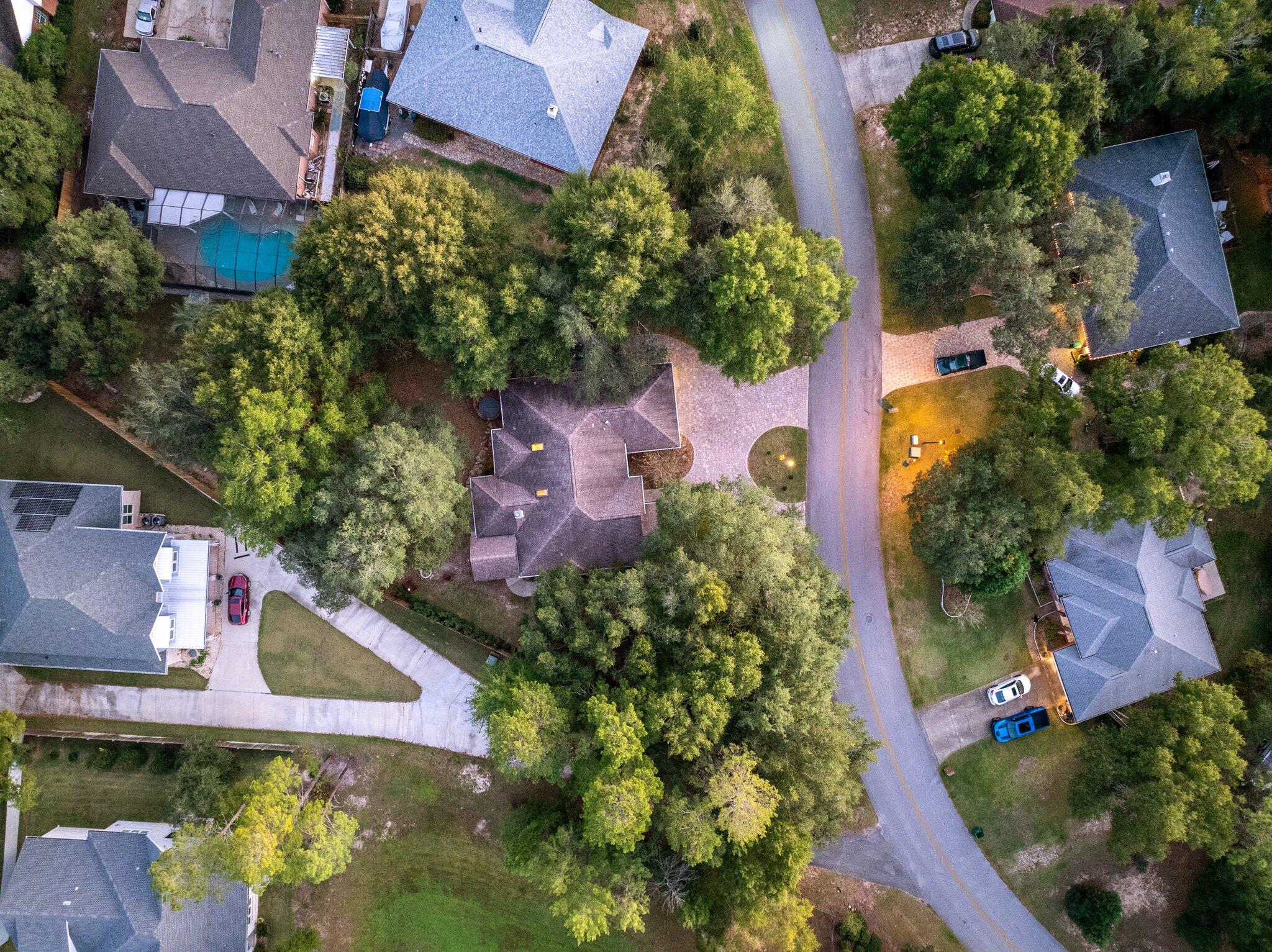 1825 Huntington Road Niceville, FL 32578 - Photo 61 of 68 an aerial view of house with yard swimming pool and outdoor seating