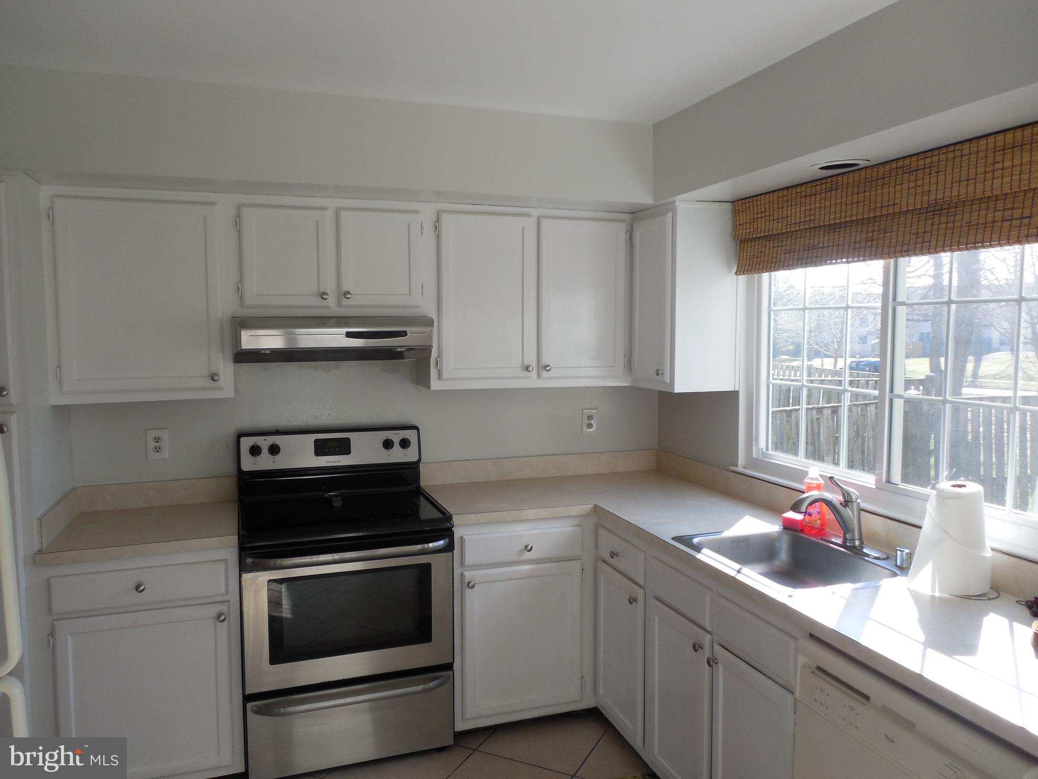 14930 Habersham Circle Silver Spring, MD 20906 - Photo 11 of 26 bright kitchen with large windows.