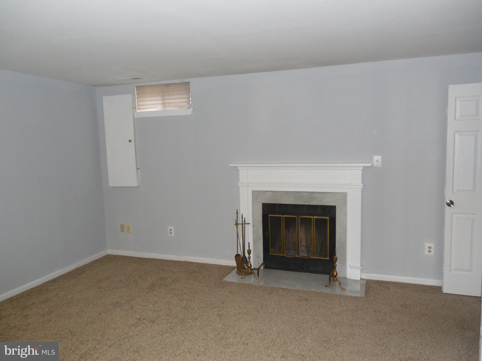 14930 Habersham Circle Silver Spring, MD 20906 - Photo 5 of 26 large family room on entrance level with fireplace