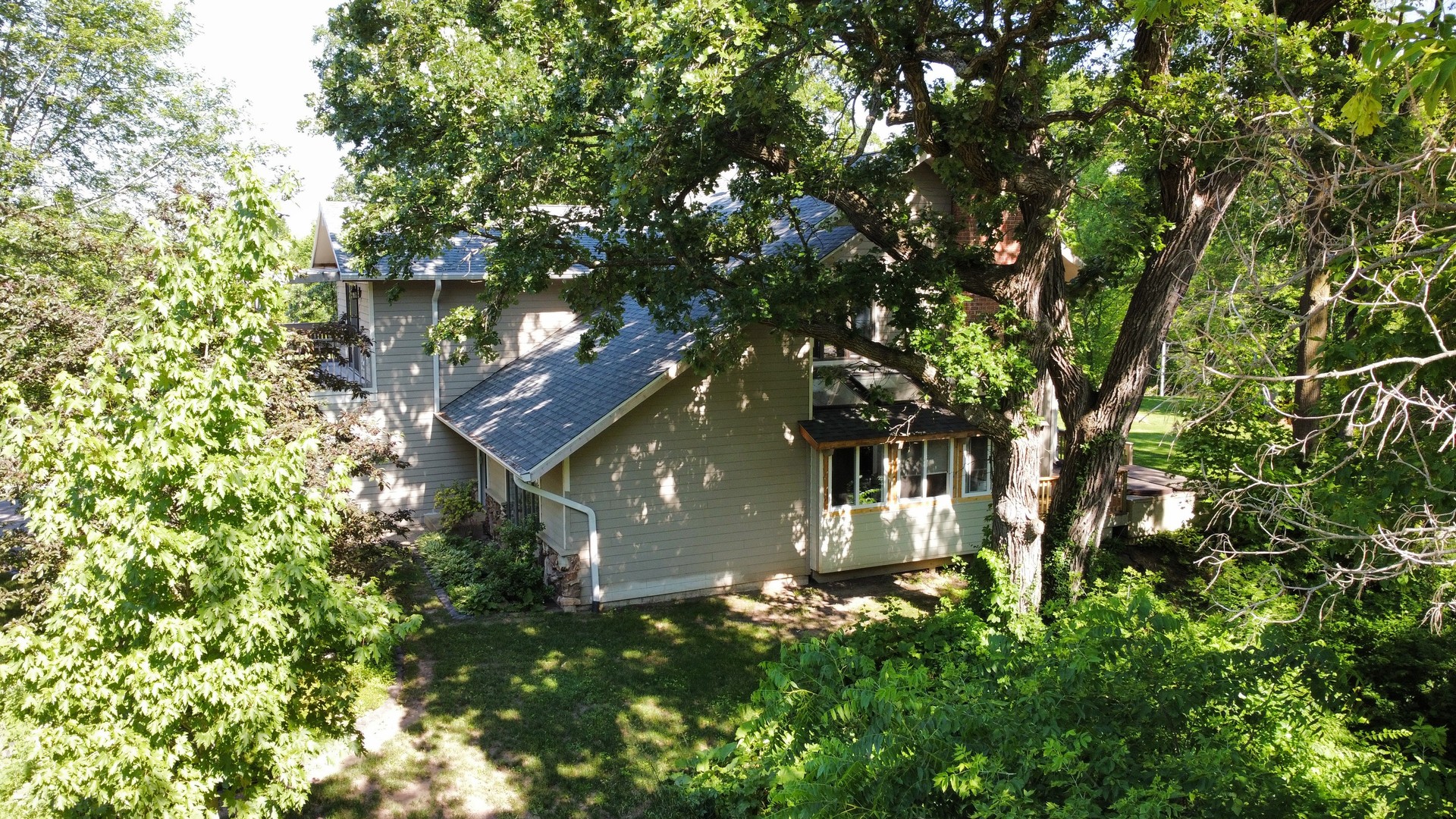 3814 May Lane Spring Grove, IL 60081 - Photo 15 of 18 a view of a house with a tree