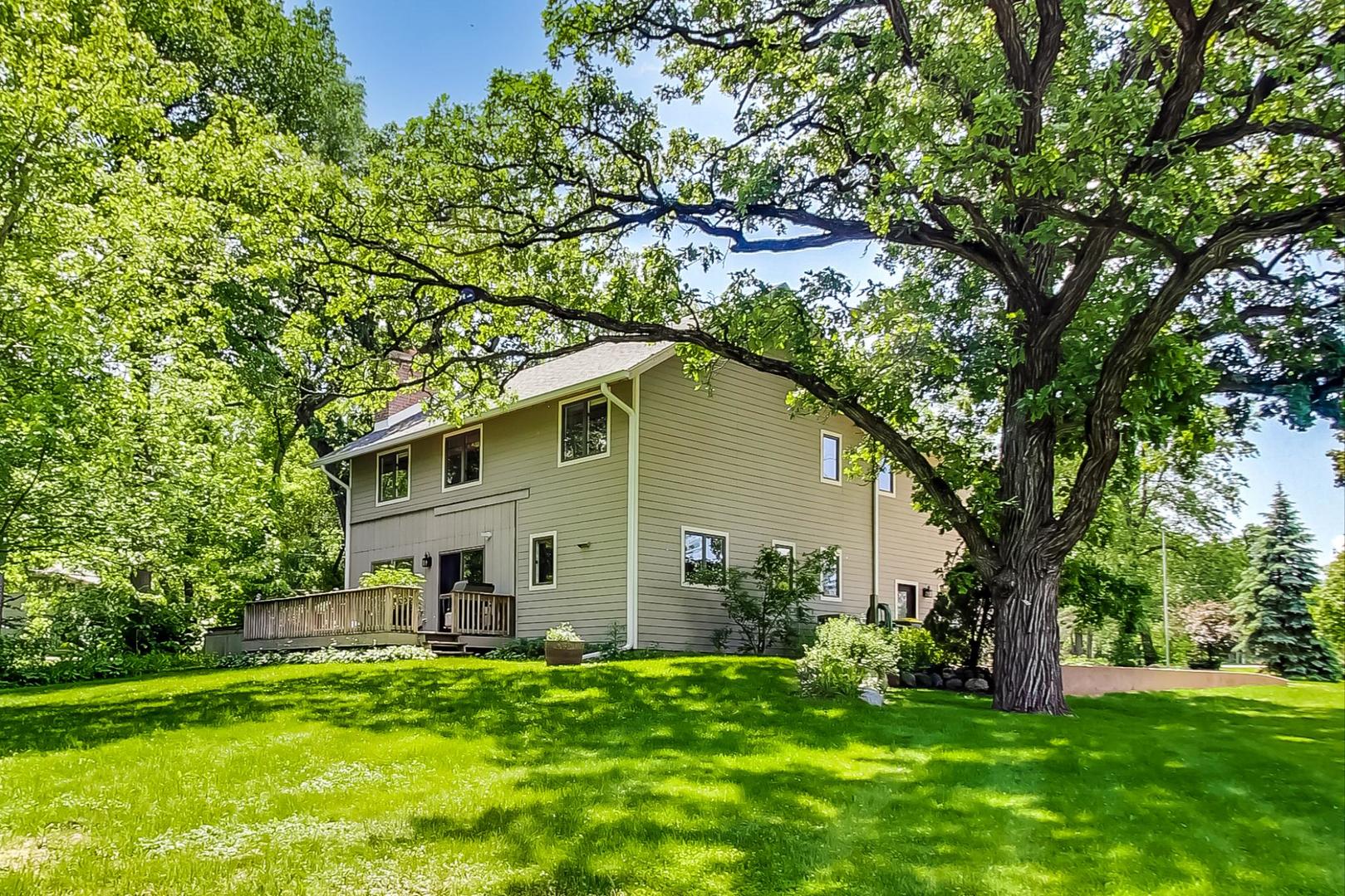 3814 May Lane Spring Grove, IL 60081 - Photo 3 of 18 a house that is sitting in the grass