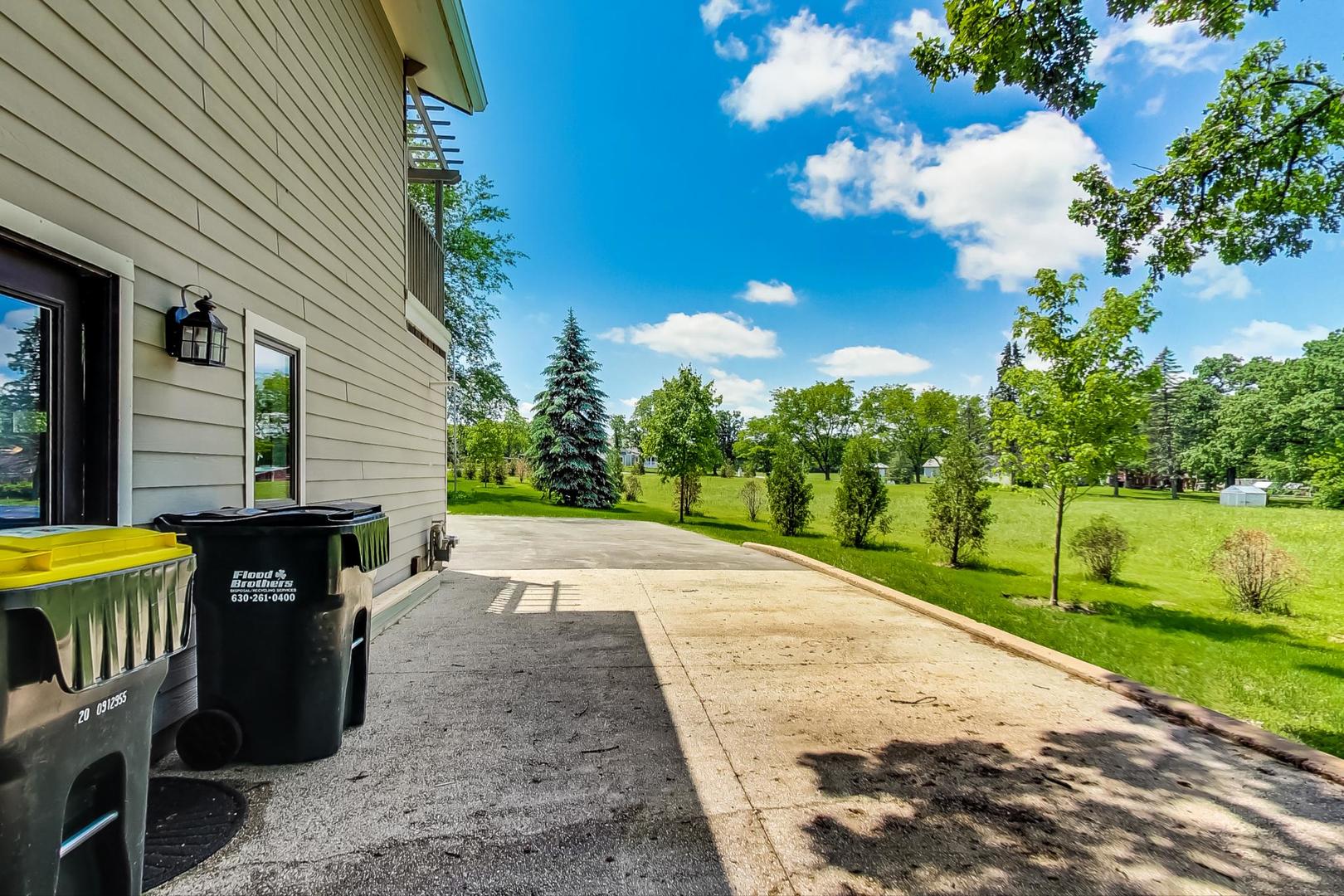 3814 May Lane Spring Grove, IL 60081 - Photo 7 of 18 a view of a backyard with sitting area