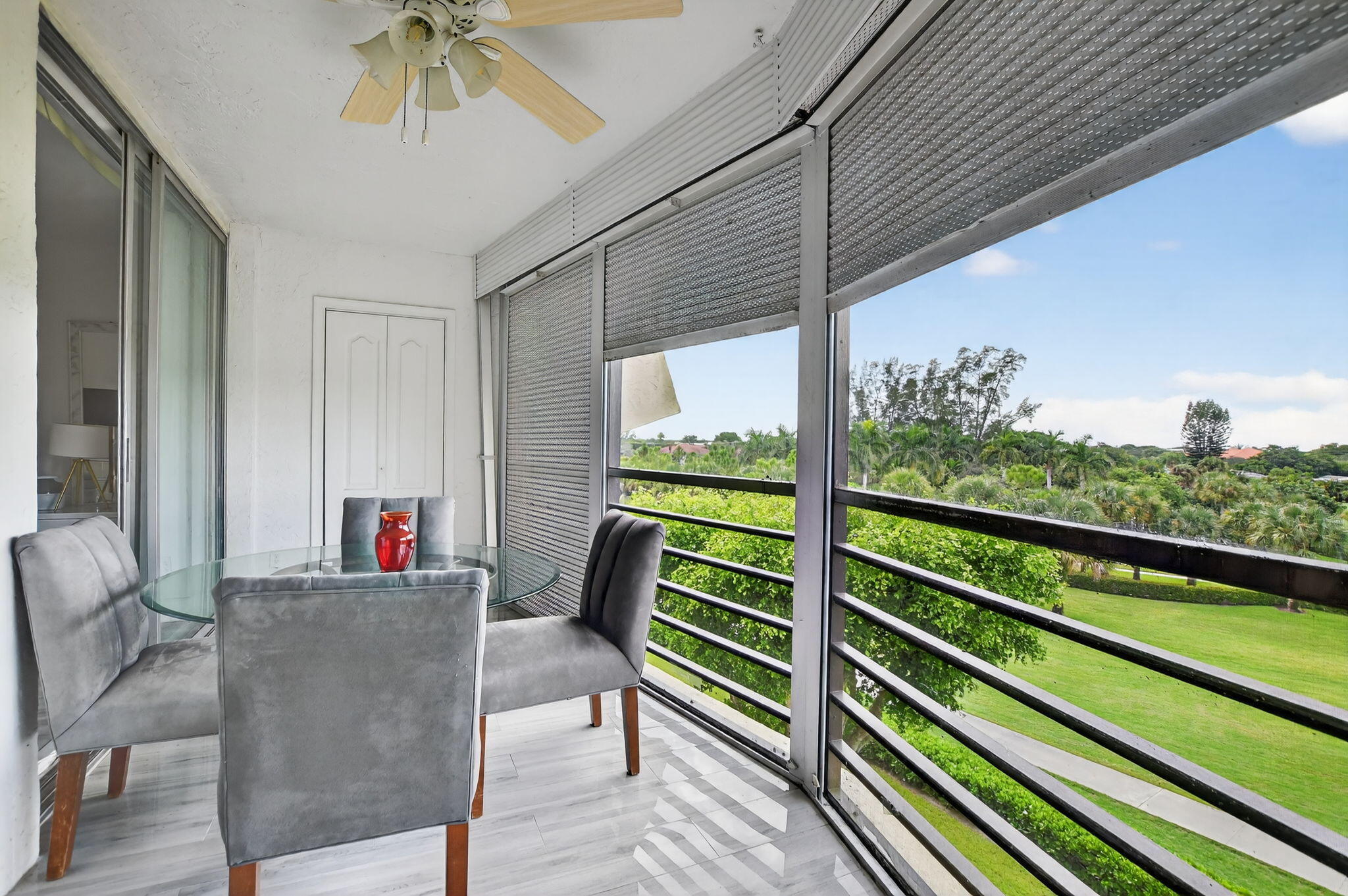 23277 Barwood Lane North, Unit 403 Boca Raton, FL 33428 - Photo 25 of 30 a view of two chairs in the balcony