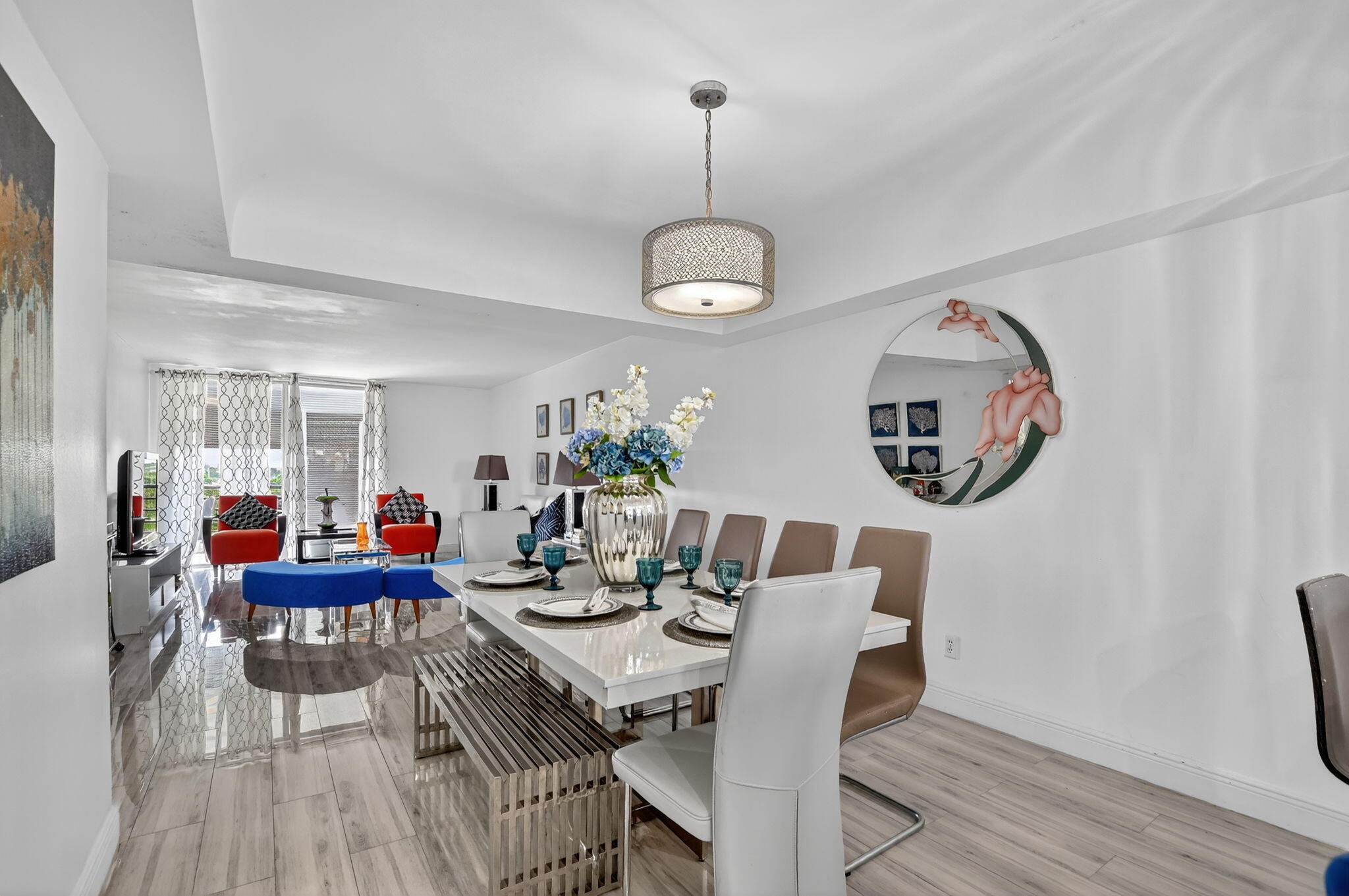 23277 Barwood Lane North, Unit 403 Boca Raton, FL 33428 - Photo 9 of 30 a view of a dining room with furniture and wooden floor