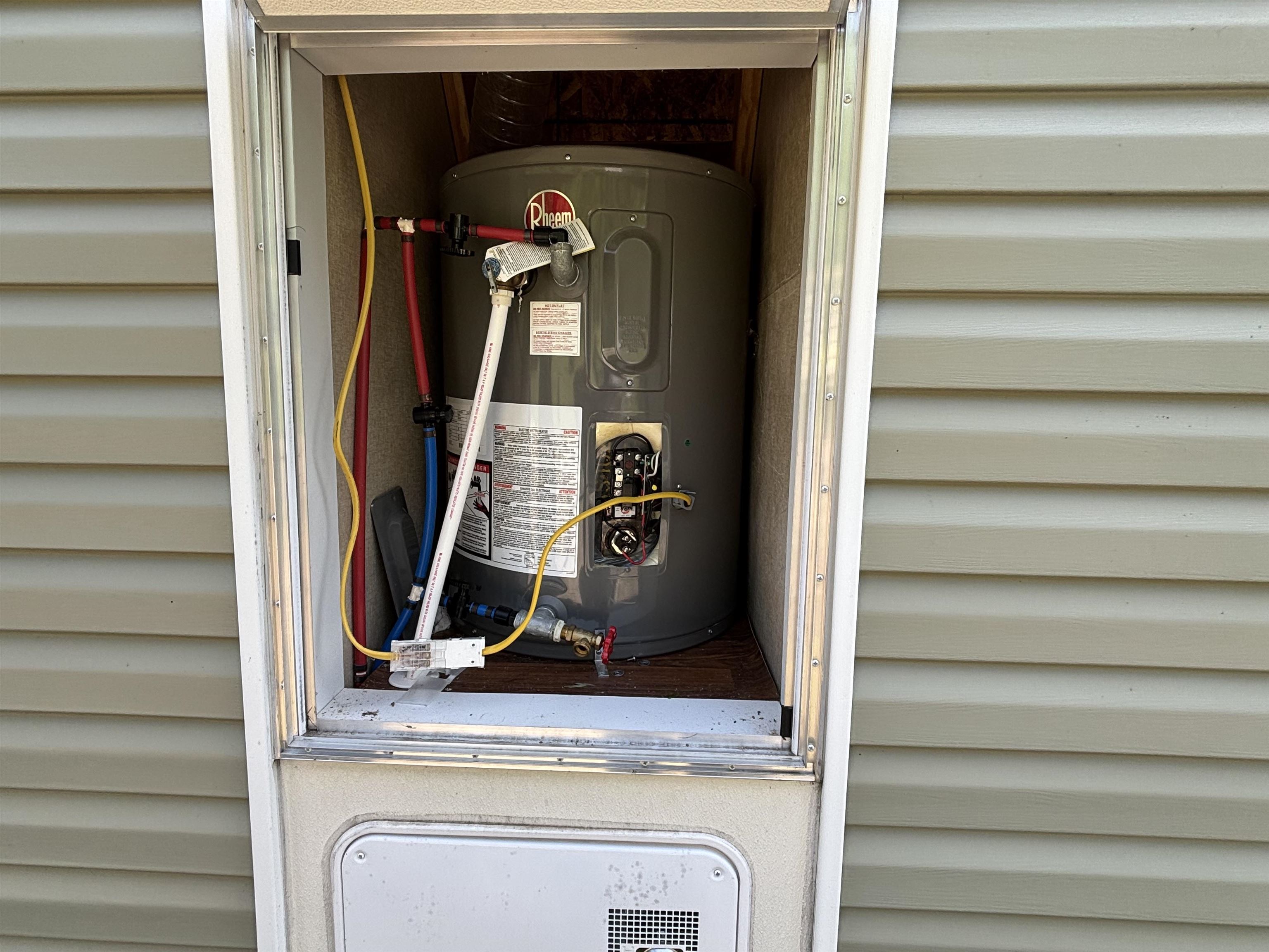 9442 Bear Ridge Drive Orr, MN 55771 - Photo 17 of 26 Exterior view of gas water heater