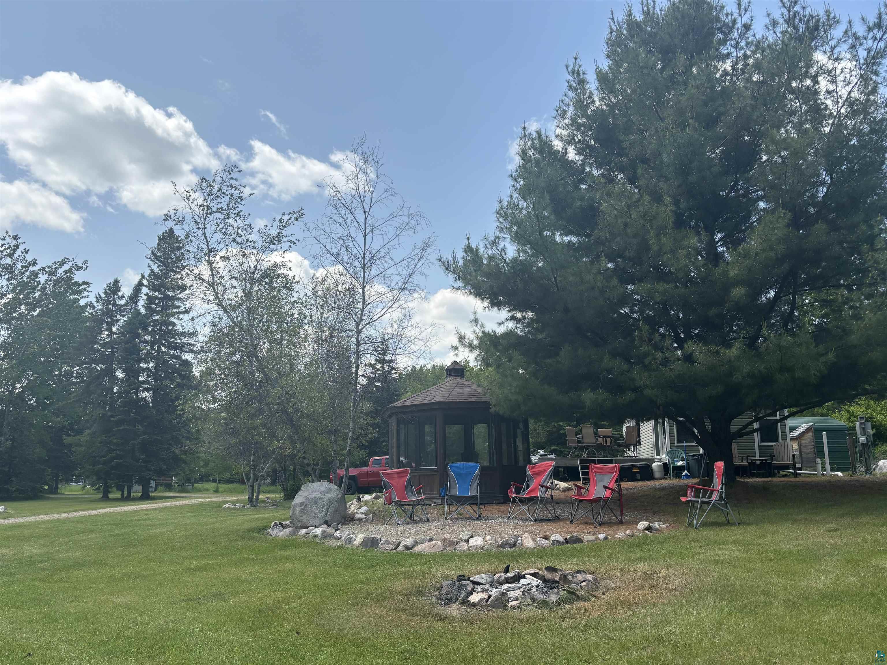9442 Bear Ridge Drive Orr, MN 55771 - Photo 23 of 26 View of grassy yard featuring a gazebo