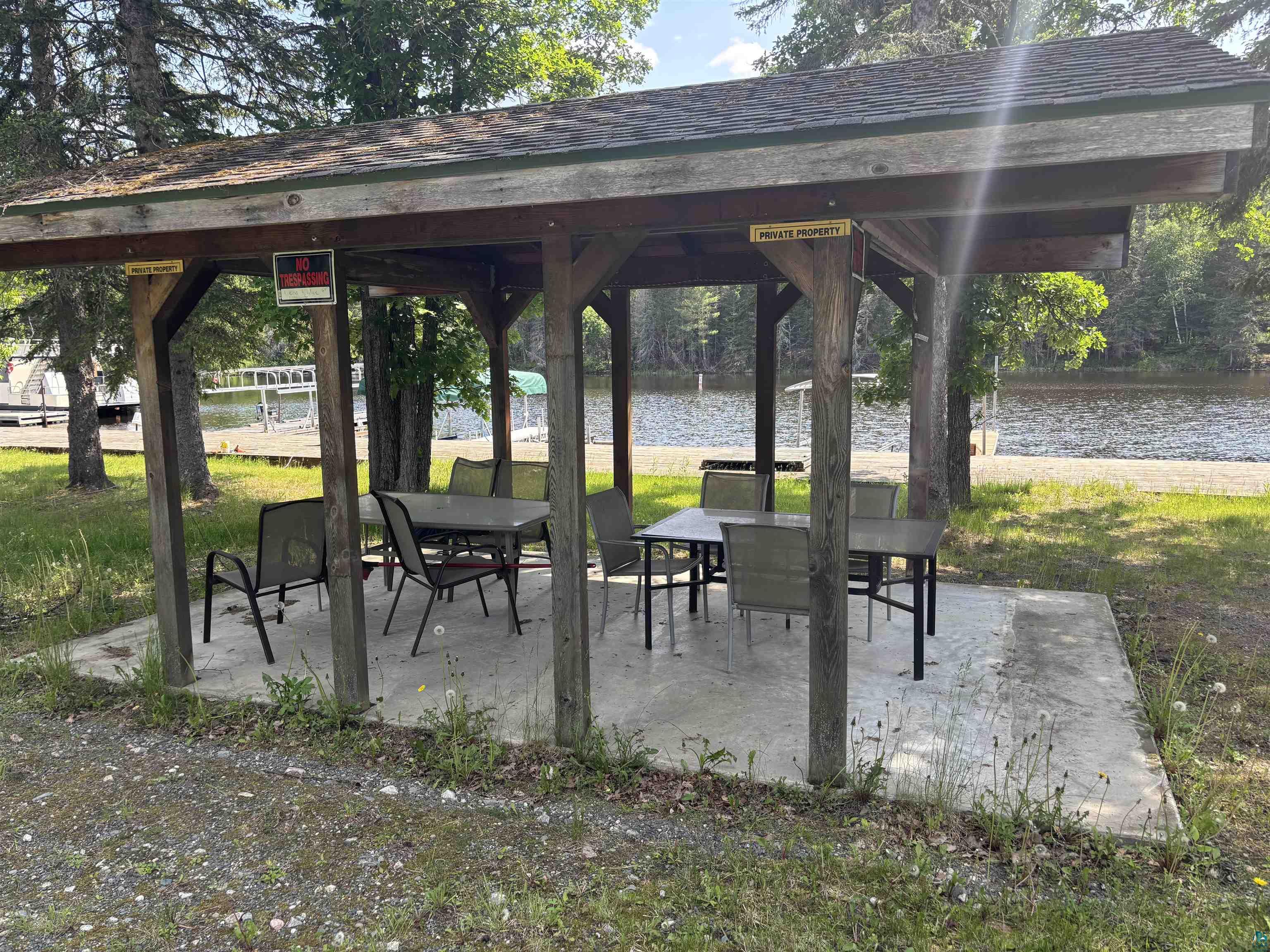 9442 Bear Ridge Drive Orr, MN 55771 - Photo 24 of 26 View of patio / terrace featuring a gazebo and a water view