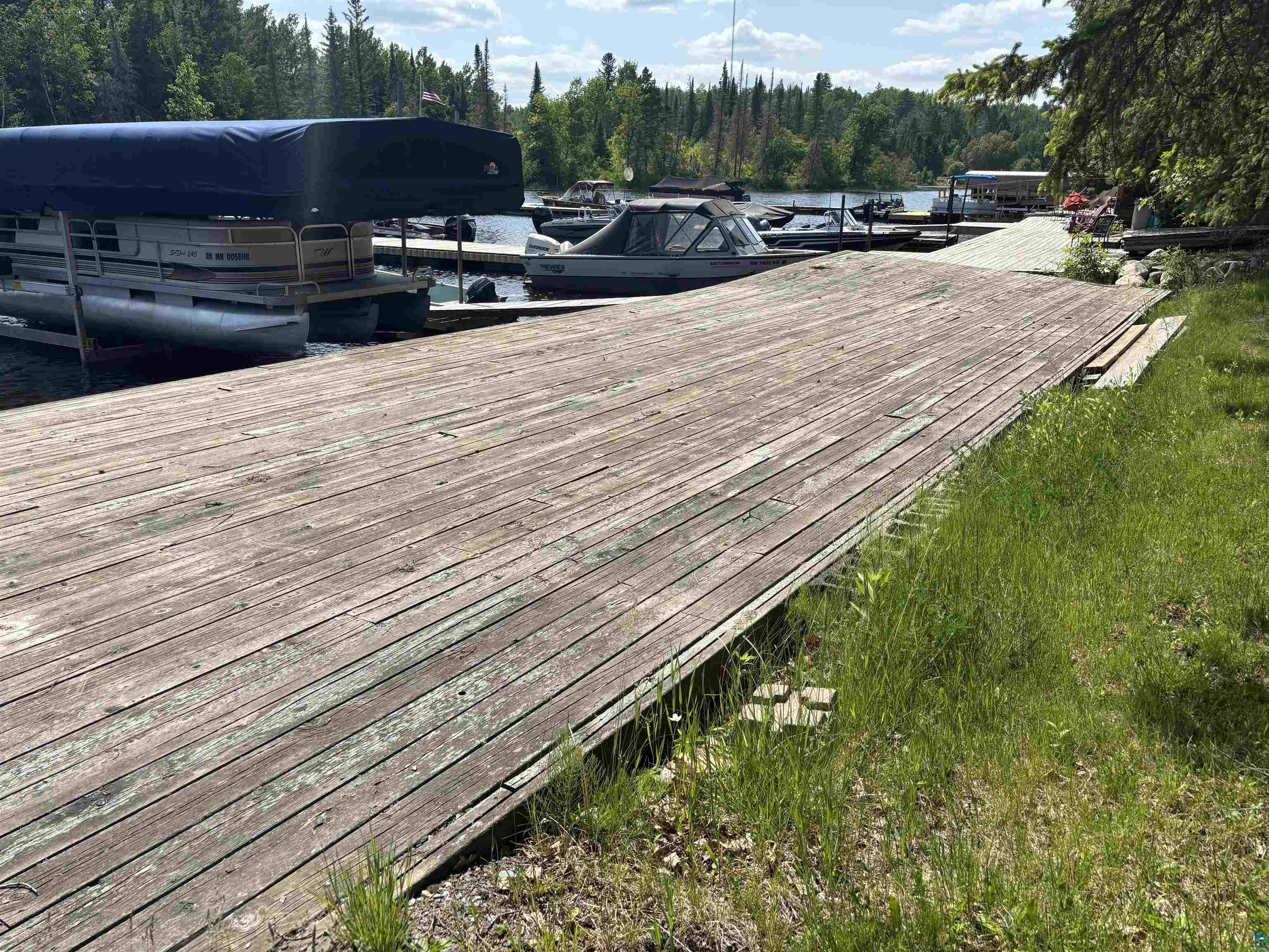 9442 Bear Ridge Drive Orr, MN 55771 - Photo 25 of 26 Dock with a view of trees