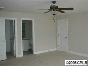 3104 East Lawyers Road Monroe, NC 28110 - Photo 6 of 7 a very nice looking room with a ceiling fan