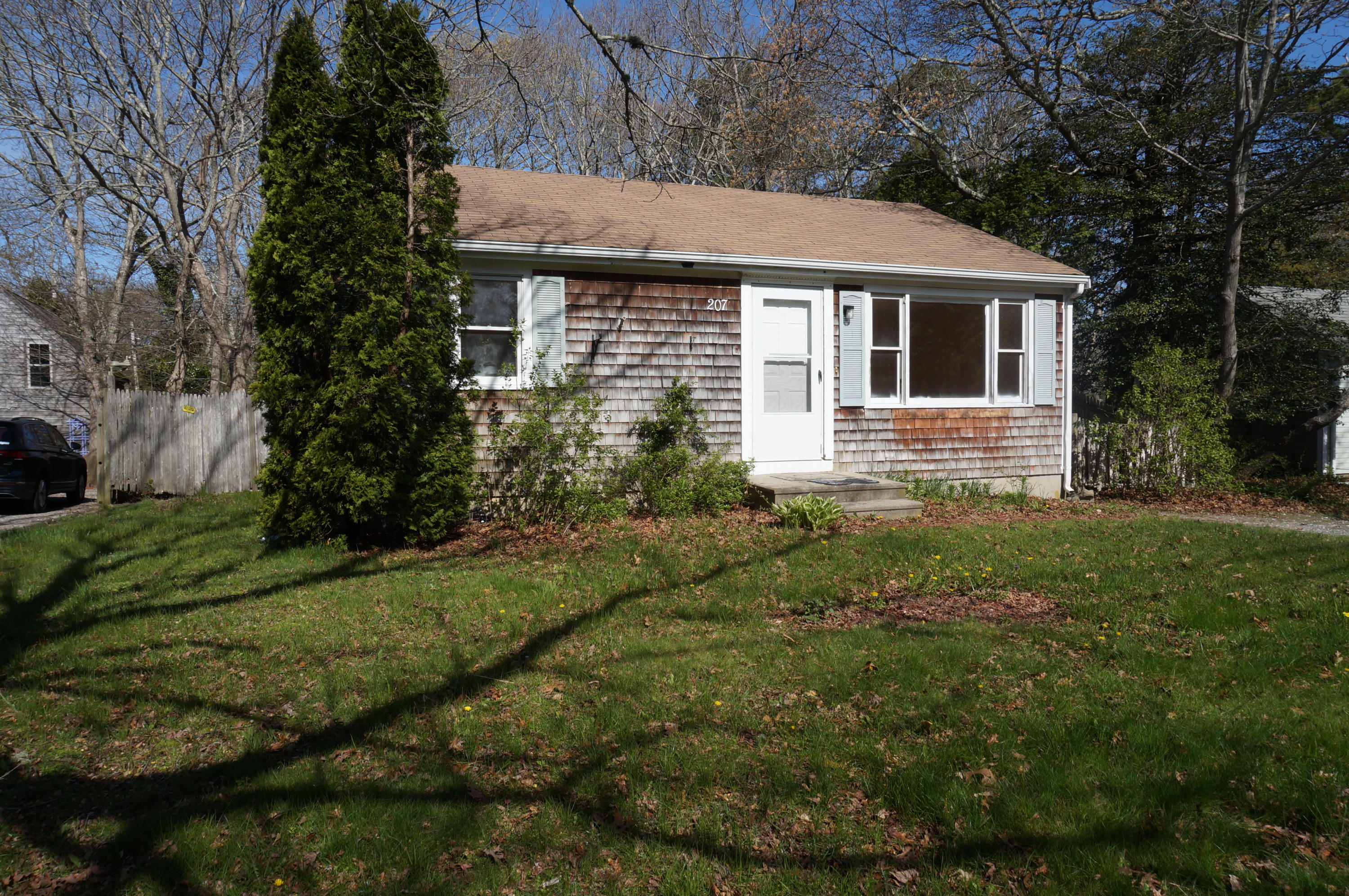207 Hinckley Road Hyannis, MA 02601 - Photo 1 of 17 a aerial view of a house with yard and green space