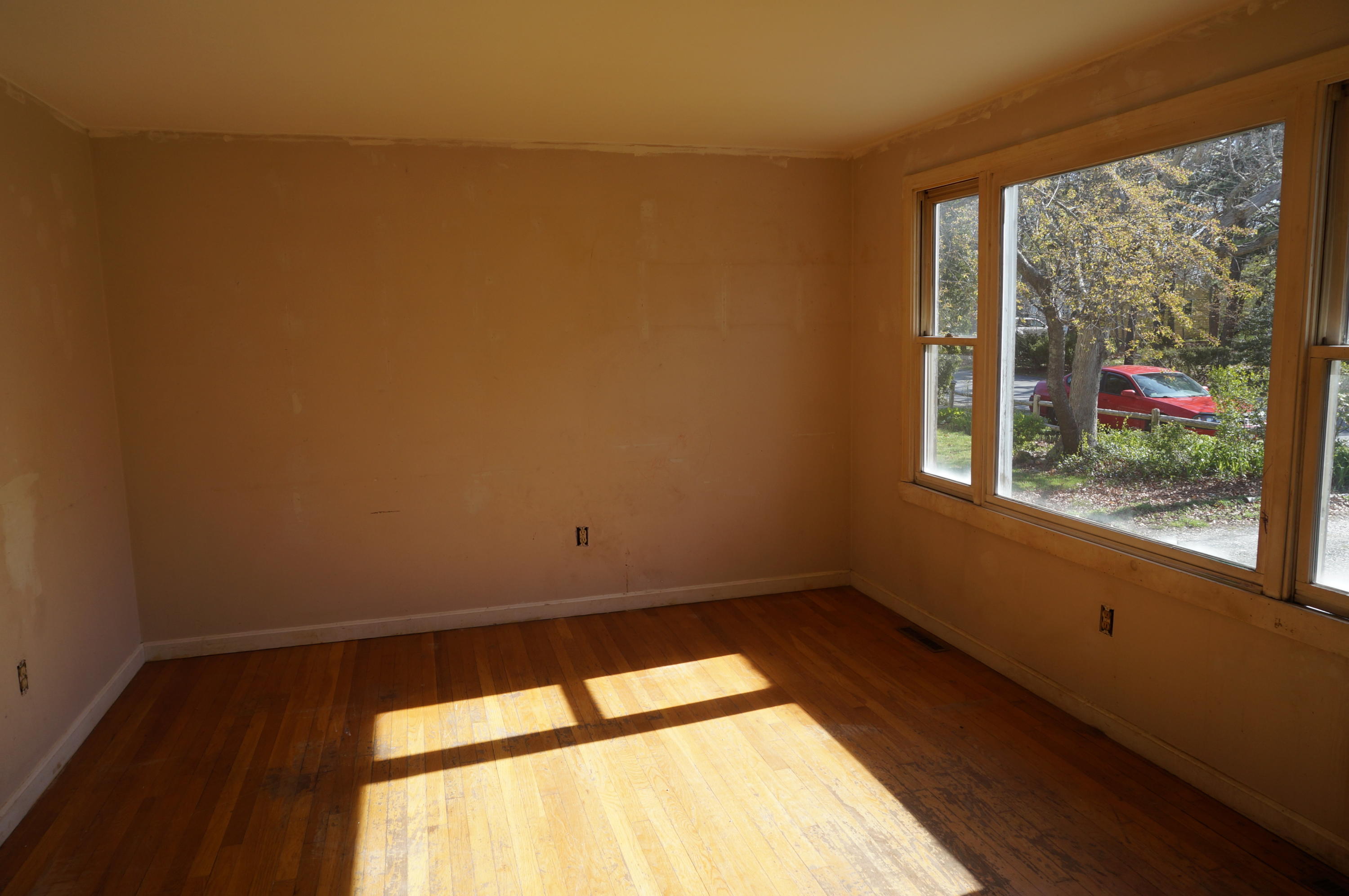 207 Hinckley Road Hyannis, MA 02601 - Photo 5 of 17 a view of an empty room with a window