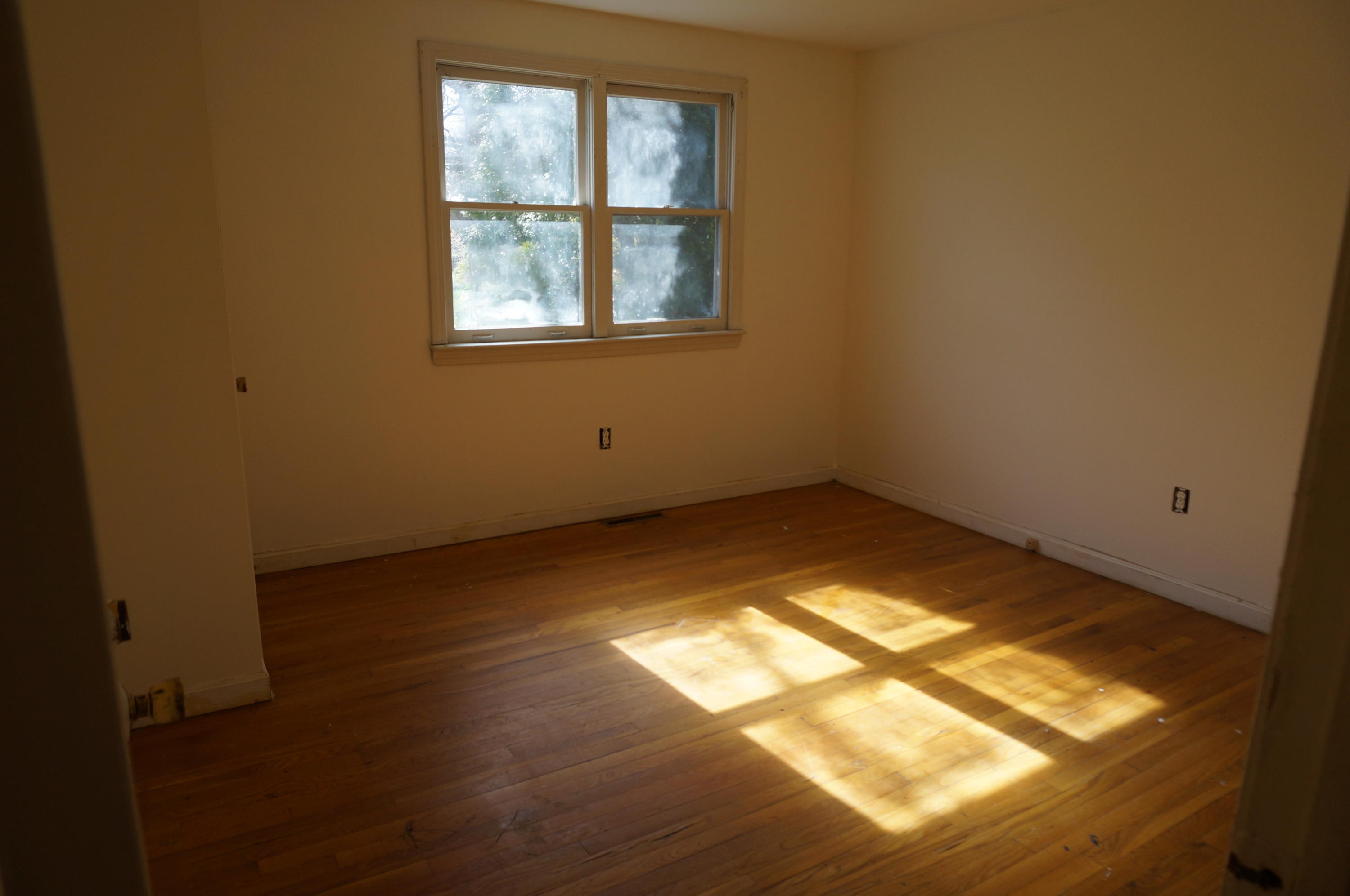 207 Hinckley Road Hyannis, MA 02601 - Photo 9 of 17 an empty room with a window
