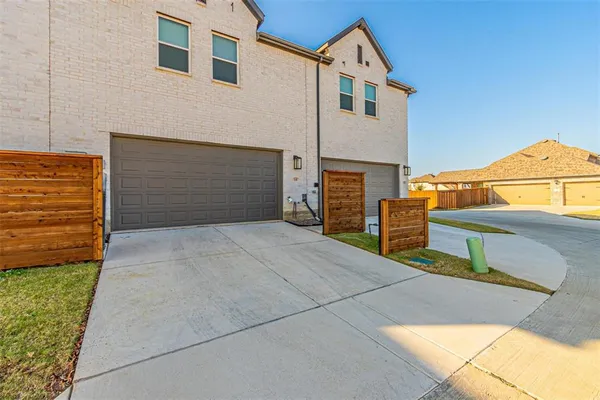 a front view of a house with a garage